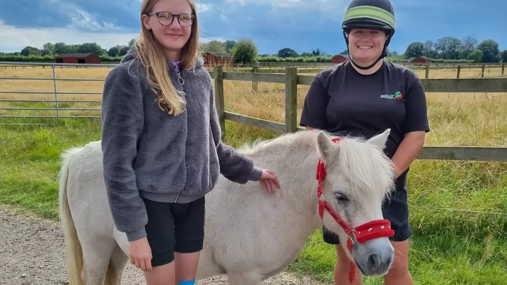 Isabel meets Adoption Star Sampson at Redwings Caldecott