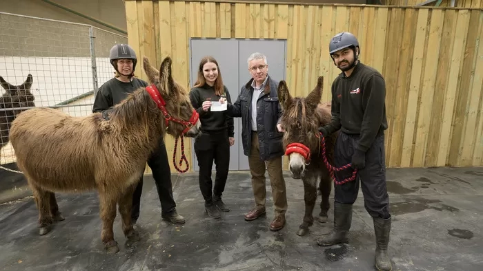 Arya and Merlin at the cheque presentation 