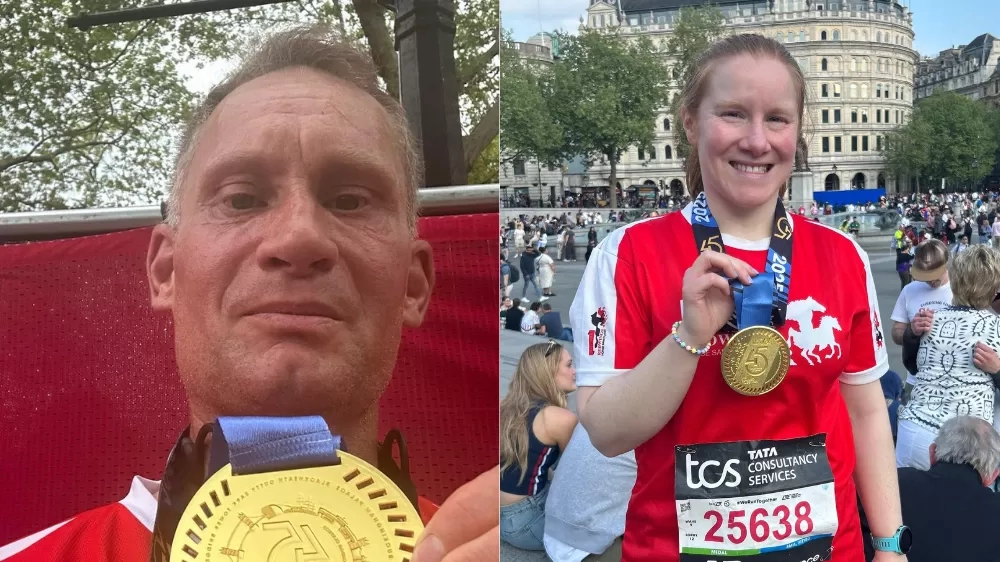 Stephen and Steph with their finisher medals