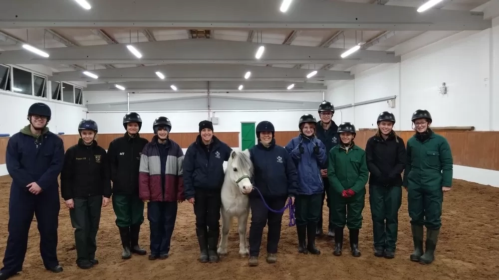 Zeus stood in line with lots of vet students 