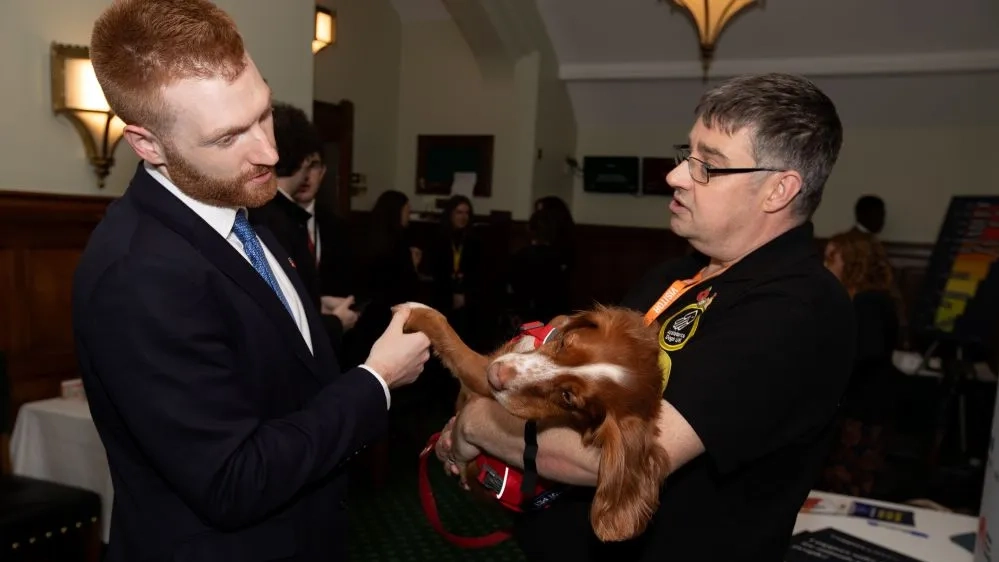 Danny Beales MP with Assistance Dogs UK at MP drop-in about fireworks