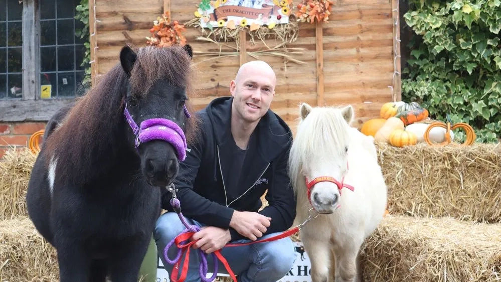 Sam Dracott with two Redwings ponies