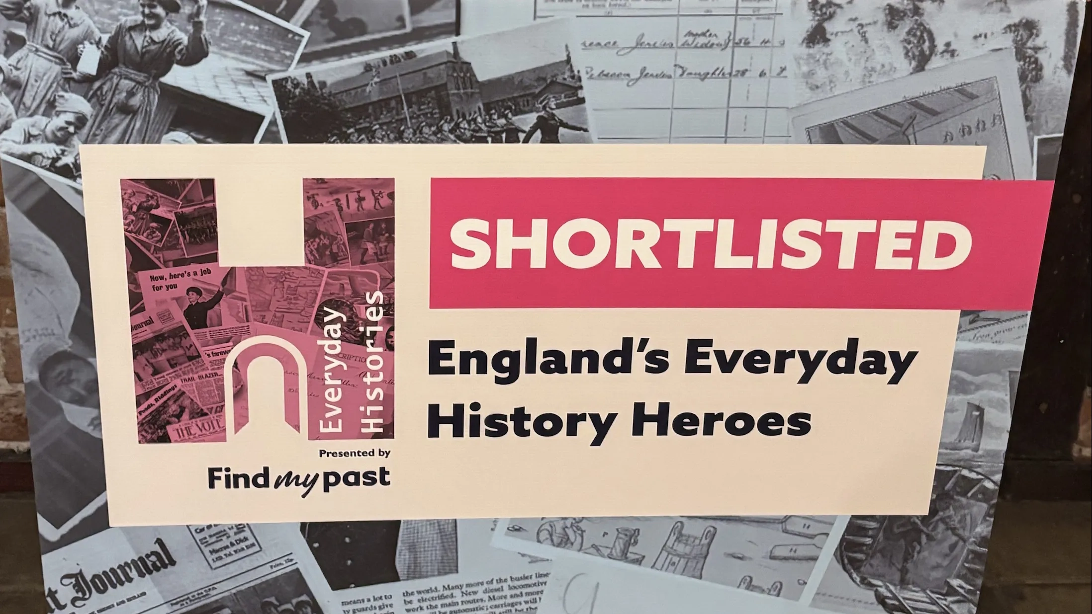 A board that says 'Shortlisted, England's Everyday History Heroes'